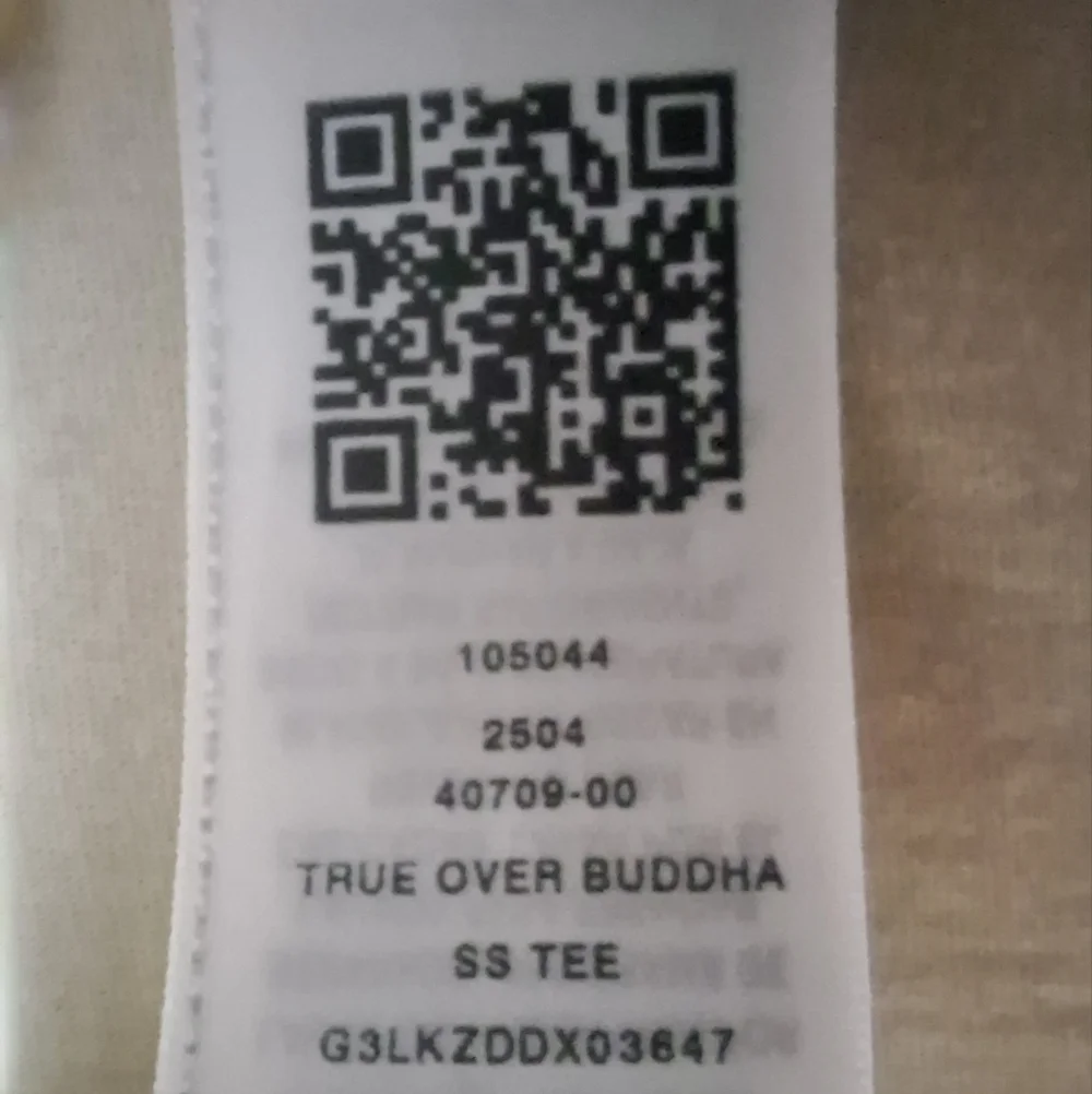 A True Religion T-shirt men's 3XL. Featuring the word True with Buddha